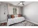 Bedroom featuring a daybed, area rug and natural lighting at 3503 E Campo Bello Dr, Phoenix, AZ 85032