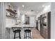 Bright kitchen with stainless steel appliances, granite countertops, modern design, and recessed lighting at 3503 E Campo Bello Dr, Phoenix, AZ 85032