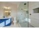 This bathroom is completed with vanity with a large, glass-enclosed shower at 3929 E Flintlock Dr, Queen Creek, AZ 85142