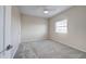 Bright bedroom with a ceiling fan, plush carpet, and natural light at 3929 E Flintlock Dr, Queen Creek, AZ 85142