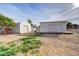 Versatile sheds in the yard, great for storage or workshop space, amidst a spacious outdoor area at 3929 E Flintlock Dr, Queen Creek, AZ 85142