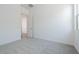 Bedroom with neutral carpet, and a doorway to the hallway at 3951 E Gold Mountain Ave, San Tan Valley, AZ 85143