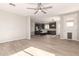 Open-concept living area flowing into the kitchen, featuring tile flooring at 4019 W Valley View Dr, Laveen, AZ 85339