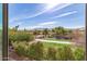 Scenic view from a window overlooking a lush green space and distant mountains at 4019 W Valley View Dr, Laveen, AZ 85339