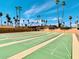 Enjoy shuffleboard on these meticulously maintained courts with desert landscaping in this active adult community at 4065 E University Dr # 407, Mesa, AZ 85205