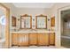 Elegant bathroom featuring dual sinks, marble countertops, and custom cabinetry at 4222 E Brown Rd # 18, Mesa, AZ 85205