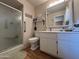 Bathroom featuring a white sink vanity, toilet, and glass enclosed shower stall at 4530 E Dragoon Ave, Mesa, AZ 85206