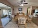 Casual dining area featuring tile floors, sliding glass doors and a wood table at 4530 E Dragoon Ave, Mesa, AZ 85206