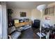 A well-lit office featuring two desks, shelves, and a window at 4530 E Dragoon Ave, Mesa, AZ 85206