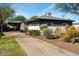 Charming single story home with a long driveway and nicely landscaped front yard at 4530 N 9Th Ave, Phoenix, AZ 85013