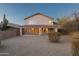 This home's backyard features a covered patio and desert landscaping and is fully enclosed by a block wall at 4625 E Thorn Tree Dr, Cave Creek, AZ 85331