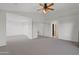 Spacious carpeted main bedroom features a ceiling fan and an arched doorway at 4625 E Thorn Tree Dr, Cave Creek, AZ 85331