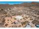 Wide aerial perspective of a contemporary home nestled in a desert landscape with ample space at 50408 N 22Nd Ave, New River, AZ 85087