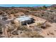 Aerial view of a desert home featuring a fenced in backyard and mountain backdrop at 50408 N 22Nd Ave, New River, AZ 85087