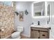 Charming bathroom with elegant decor and a modern vanity with a lighted mirror at 50408 N 22Nd Ave, New River, AZ 85087