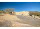 Single Gathering home featuring desert landscaping and an attached two car garage at 50408 N 22Nd Ave, New River, AZ 85087