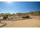 Southwestern home featuring a desert landscaped front yard and desert surroundings at 50408 N 22Nd Ave, New River, AZ 85087