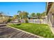 Backyard with artificial grass, a hammock, and a shaded gazebo, perfect for outdoor living at 5110 S Sandstone St, Gilbert, AZ 85298