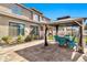 Backyard patio with gazebo features pavers and ample seating with a backyard view at 5110 S Sandstone St, Gilbert, AZ 85298