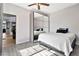 Bright bedroom with an oversized mirror and tile floors at 5110 S Sandstone St, Gilbert, AZ 85298