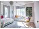 Bright, pink bedroom featuring a window seat and a chandelier at 5144 E Calle Del Medio --, Phoenix, AZ 85018