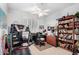 Bedroom with a ceiling fan, window, and desk at 5545 E Helena Dr, Scottsdale, AZ 85254