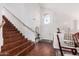 Inviting entryway featuring hardwood staircase and stylish decor at 5545 E Helena Dr, Scottsdale, AZ 85254