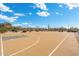 Outdoor basketball court with a modern color scheme, surrounded by desert landscaping, perfect for community recreation at 5904 E Calle De Las Estrellas Rd, Cave Creek, AZ 85331