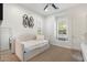 Bright bedroom with neutral tones, daybed, and natural light from the window at 5904 E Calle De Las Estrellas Rd, Cave Creek, AZ 85331