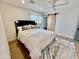 Bedroom with light wood floors and bright white walls and ceilings at 6325 N 83Rd Pl, Scottsdale, AZ 85250