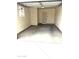 A clean, spacious two-car garage with window and door to the interior at 6325 N 83Rd Pl, Scottsdale, AZ 85250