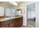 Bathroom with granite countertops, double sinks, and ample cabinet space at 6711 E Camelback Rd # 43, Scottsdale, AZ 85251