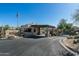 Elegant gated community entrance with desert landscaping and a welcoming atmosphere for residents and guests at 6711 E Camelback Rd # 43, Scottsdale, AZ 85251