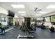 Spacious home gym with modern exercise equipment, mirrors, and ample natural light from the windows at 6711 E Camelback Rd # 43, Scottsdale, AZ 85251