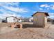 Wide backyard view with outbuilding, surrounded by block wall fencing at 737 W Jones Ave, Phoenix, AZ 85041