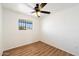 Bright bedroom featuring neutral walls, laminate flooring, and natural light at 737 W Jones Ave, Phoenix, AZ 85041