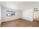 Bright living room with sleek flooring and a large window, creating a welcoming space at 737 W Jones Ave, Phoenix, AZ 85041