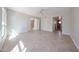 Spacious bedroom features tile flooring, ceiling fan, and double doors at 7800 E Lincoln E Dr # 1102, Scottsdale, AZ 85250