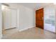 Home entryway with tile flooring, closet, and bright light at 7800 E Lincoln E Dr # 1102, Scottsdale, AZ 85250