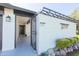 Stylish metal gate leading to a cozy courtyard with meticulously maintained landscaping at 837 E Divot Dr, Tempe, AZ 85283