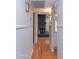 Hallway view of brick fireplace with mantle and decor at 837 E Divot Dr, Tempe, AZ 85283