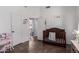 Bedroom with modern decor and a cute wood crib at 8850 W Laurel Ln, Peoria, AZ 85345