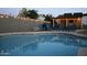 Inviting backyard pool with lounge seating, ideal for relaxation and outdoor entertainment at 932 W Julie Dr, Tempe, AZ 85283