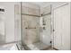 Modern bathroom featuring a glass shower with tile surround at 9901 N 51St Pl, Paradise Valley, AZ 85253