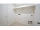 A dedicated laundry room with tile flooring and washer and dryer hookups at 10146 W Watkins St, Tolleson, AZ 85353