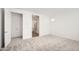 Carpeted room featuring a closet and an open doorway to the bathroom at 10209 E Ursula Ave, Mesa, AZ 85212