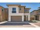 Beautiful two-story home featuring a two-car garage, desert landscaping, and a modern design at 10209 E Ursula Ave, Mesa, AZ 85212