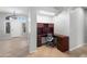 Bright entryway featuring a built-in desk and tiled floors at 10449 E Lomita Ave, Mesa, AZ 85209