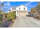 Charming two-story home with a spacious driveway and well-maintained landscaping at 1052 W Capulin Trl, San Tan Valley, AZ 85140