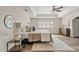 Cozy bedroom with natural light and a neutral color palette at 10540 N 78Th Pl, Scottsdale, AZ 85258